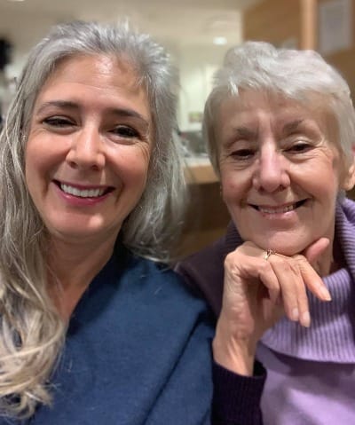 Woman with her Mom - Parent Caregiving and earning income online